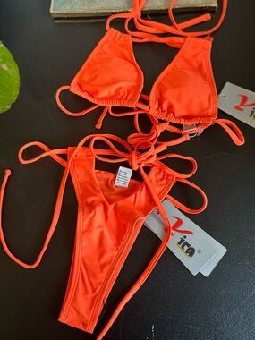 Yira Neon orange two piece bikini with strappy bottoms size Small